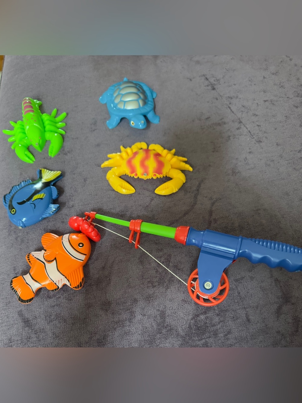 Magnetic Fishing Rod with Bright Multicolored items: Crab, fish turtle, lobster